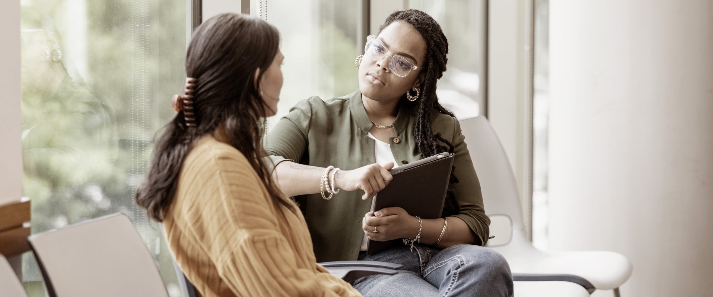 Two women having a discussion.